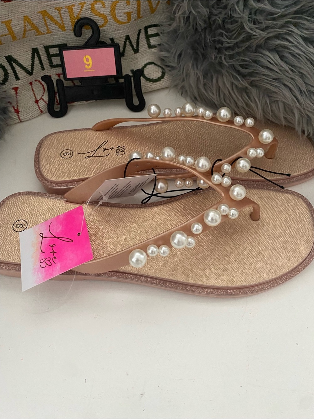 Love Women’s Pearl-Embellished Nude Flip Flops